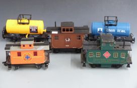 Five Bachmann and similar G gauge vans and tankers including Chemical, Railway Express Agency,