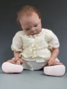Laura Tuzio-Ross Reborn silicone doll with open mouth, blue eyes and brown hair, marked to the
