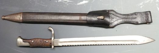 German 1898/05 pattern sawback bayonet, with part muzzle ring and flashguard, some clear stamps,