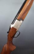 Winchester Model 91 12 bore over and under ejector shotgun with engraved lock, trigger guard, top