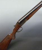 Astra Imperial 12 bore side by side shotgun with engraved locks, trigger guard underside and top