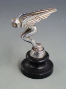 Art Deco speed nymph vintage car mascot, marked to base Desmo, on ebonised stand, overall height