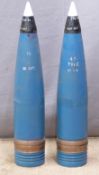 Two British Royal Navy 4.5 inch Mk8 gun practice rounds with fuses marked plug No5 Mk1 TRE76