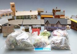 A collection of Tri-ang and similar 00 gauge model railway buildings and accessories.