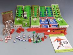 A collection of Subbuteo table soccer teams and accessories including Brazil, West Ham, Newcastle,