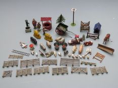 Over 50 Britains and similar farmyard animals, figures and accessories.