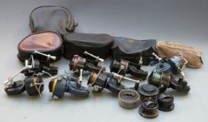 Eight Mitchell fixed spool fishing reels, models include Match, 300, 300A, 324, 441A, 410 etc,
