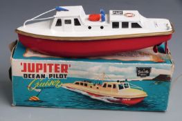 Sutcliffe clockwork tinplate 'Jupiter' Ocean Pilot Cruiser with white deck and red hull, in original