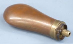 Copper and brass pistol or revolver powder flask, 11cm long.