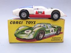 Corgi Toys diecast model Porsche Carrera 6 with white body, red bonnet and doors, blue engine cover,