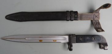 Russian AK49 bayonet stamped U888 to crosspiece with 20cm fullered blade, scabbard and belt loop