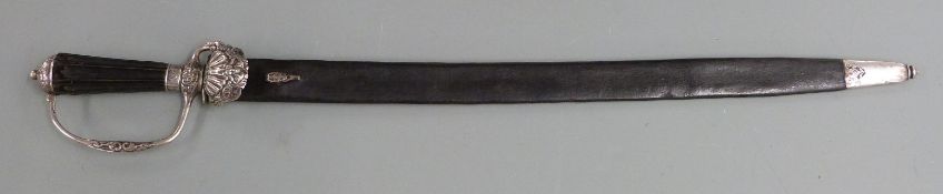 German hunting sword circa 1770 with clam shell guard and 52cm single edged fulllered blade, with
