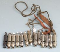 Thirteen military interest whistles including Hudson examples dated 1899, 1915, 1943 and 1953,