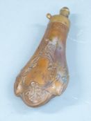 Copper and brass powder flask with embossed decoration to both sides, 20.5cm long.