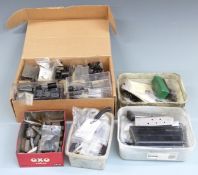 A large collection of gun parts including magazines, sights etc, some in original boxes.