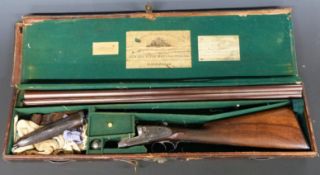 Cased William Powell & Son 12 bore sidelock side by side ejector shotgun with named and engraved