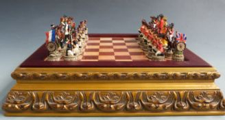 Franklin Mint Napoleonic War chess set with figural pieces, in original fitted wooden box.