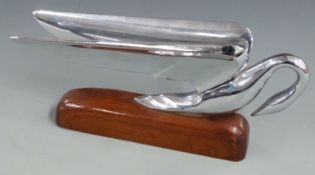 Packard swan car mascot, circa 1952, on wooden base, length 28cm