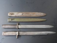 Two German Ersatz all steel bayonets, both with 31cm blades and scabbards, one marked FAG