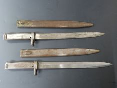 Two German Ersatz all steel bayonets, one stamped 7310 to crosspiece, the other 9162, both with 31cm