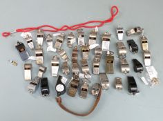 A collection of whistles including ACME Thunderer, FOX 40, 1948 US military example etc