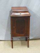 Mahogany cabinet with sarcophagus top and single drawer, W40 D38 H80