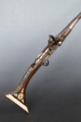 North African, Afghan or similar flintlock hammer action jezail with ornately decorated stock inlaid