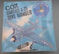 Cox Curtiss A-25 US Army Dive bomber with petrol engine, in original box with instructions.