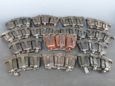 A small collection of triple leather ammunition pouches including makers Ehrhardt Kirsten Taucha