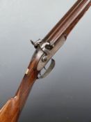 Joseph Manton 14 bore side by side percussion hammer action gun with named and engraved locks,