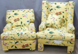 Two bespoke armchairs with yellow raised 'embroidery' style fabric decorated with flowers and