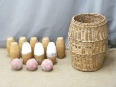 A set of 'Durapin' skittles and balls in wicker basket
