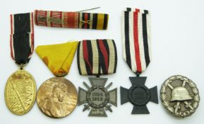 German WWI medals comprising Cross of Honour with Swords, Cross of Honour, Kyffhauser (veterans)
