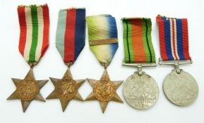 WWII medals comprising 1939/1945 Star, Italy Star, Atlantic Star with clasp for France & Germany,