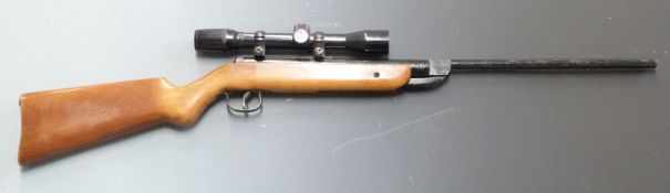 Original Model 25 .22 air rifle with semi-pistol grip and Original Model 10 4x32 scope, NVSN.
