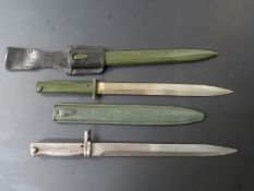 Two German Ersatz all steel bayonets, one stamped 1302 to crosspiece, both with 31cm blades with