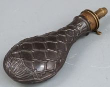 Steel and brass powder flask with embossed rope and acanthus leaf decoration to both sides, 21cm