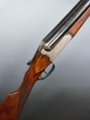 Denton & Kennell 12 bore side by side shotgun with  named and engraved lock, engraved trigger guard,