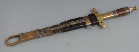 A 19thC African tribal Tuareg or Berber dagger with copper, white metal and brass hilt, inlaid
