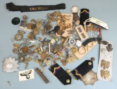 Cap badges including The Border Regiment, Lancashire Fusiliers and Royal Artillery together with