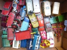 Twenty-nine Dinky and Corgi Toys diecast model vehicles including Smiths Karrier Ice Cream van,