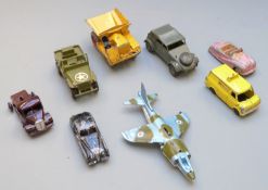Eight Dinky Toys diecast model vehicles including Volkswagen CDF, Battle Lines, Jaguar, Austin