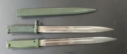 Two German Ersatz all steel bayonets, both with 31.5cm fullered blades, one with scabbard stamped 6K