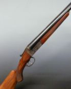 Ebore 12 bore side by side shotgun with engraved locks, trigger guard underside and top plate,