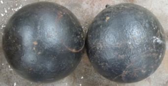 Two 19th or early 20thC cast iron 12 inch mortars with lifting eyes. Consigned by a Royal Navy
