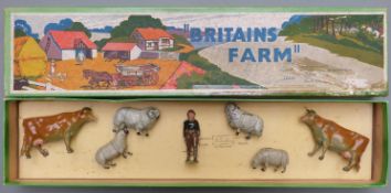 Britains Farm lead model figure set comprising girl, two cows, two rams and four sheep, 54F, in