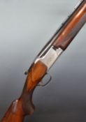 Miroku 12 bore over and under ejector shotgun with engraved lock and top plate, chequered semi-