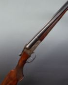 Baikal Model 54 12 bore side by side shotgun with engraved locks, trigger guard underside and top