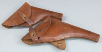 British Webley leather pistol or revolver holster 35cm long together with a similar example, 30cm