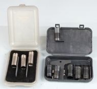 Six Winchester 20 bore and three unnamed 28 bore shotgun chokes, in two fitted boxes.